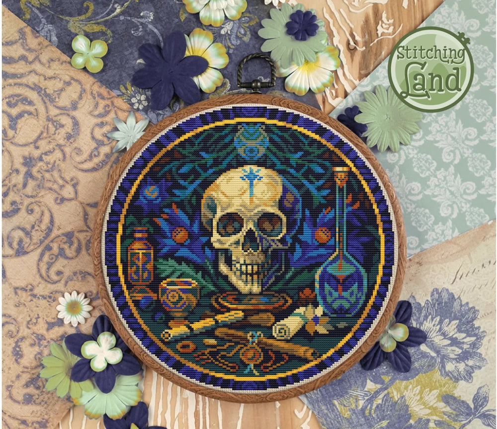 Stamped cross stitch design of a skull design surrounded by flowers and decorative elements, brand 'Stitching Land' visible.