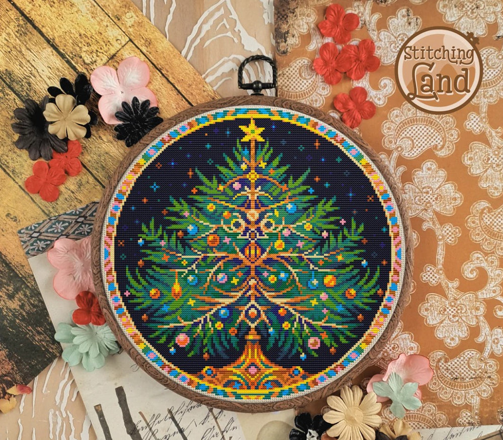 Stamped cross stitch design of Christmas tree design in an embroidery hoop on a decorative background with flowers.