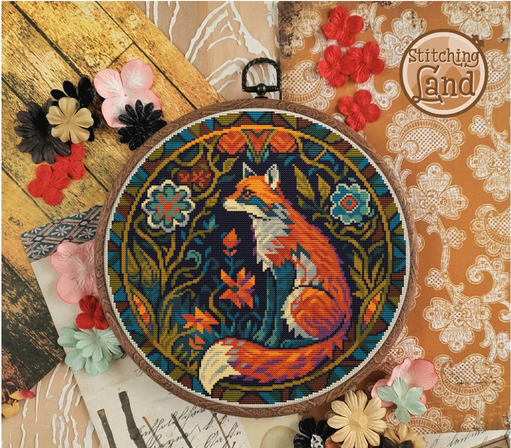 Stamped cross stitch design of a fox design surrounded by colorful flowers on a textured background.