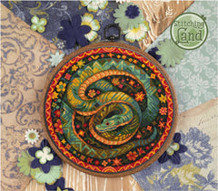 Stamped cross stitch design of a colorful snake design on a textured fabric background with flowers.