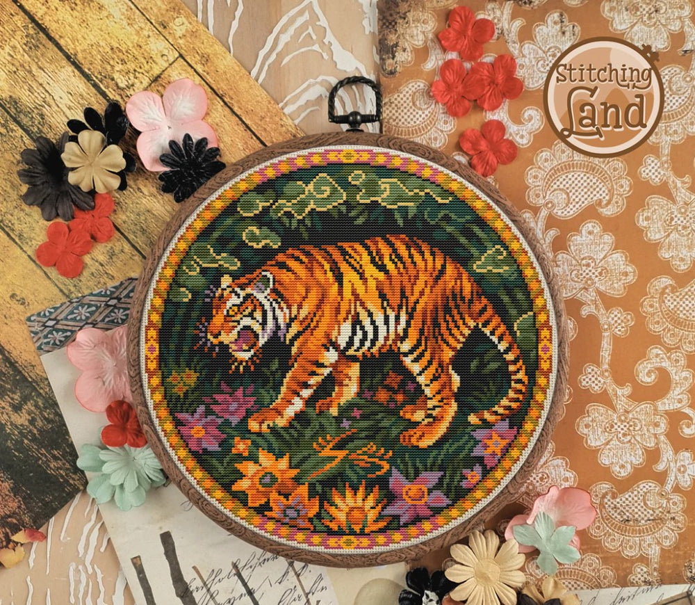 Mockup of a stamped cross stitch showing a tiger stalking through a forest