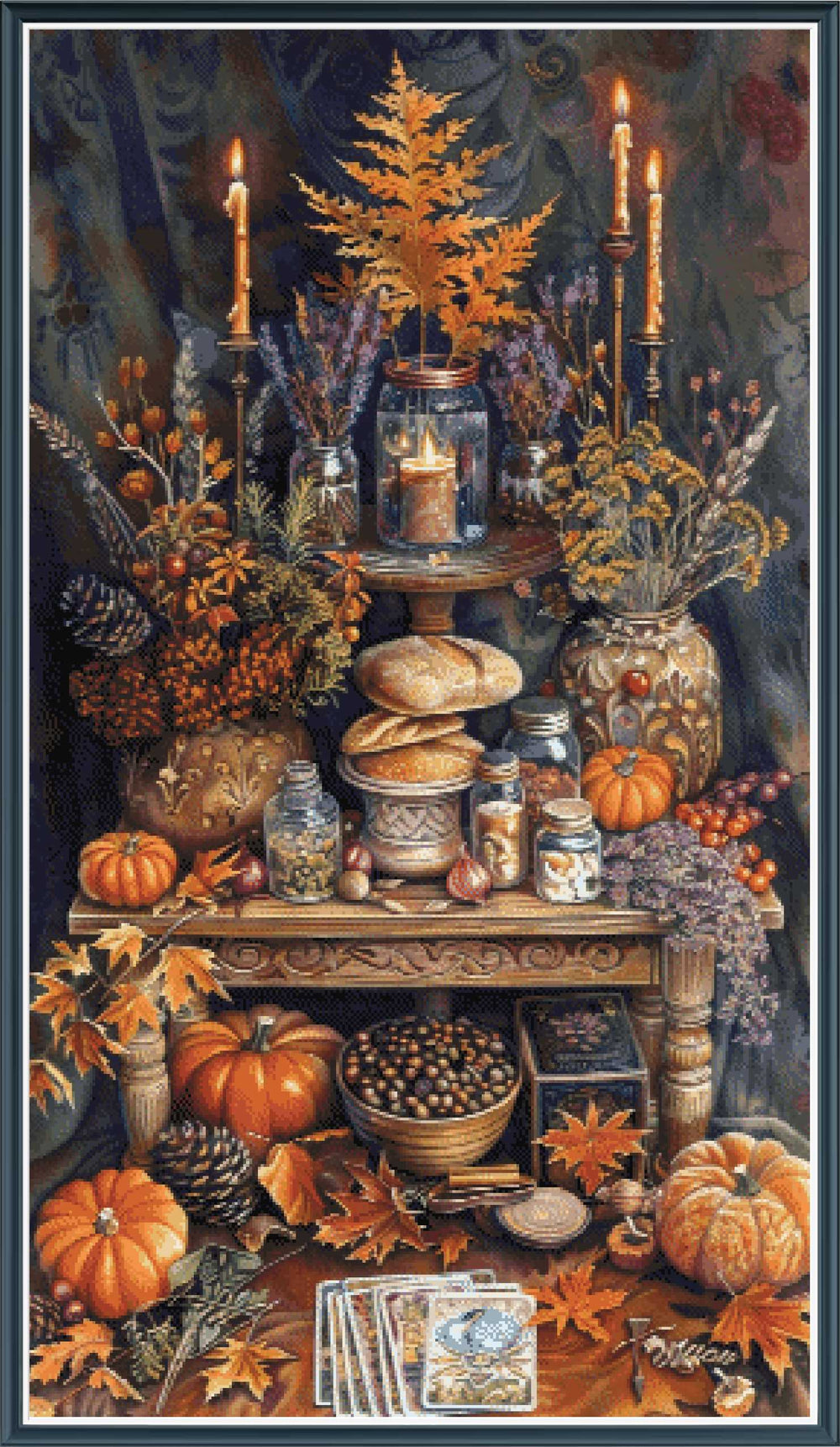 Stamped cross stitch design of a table with pumpkins, candles, and autumnal elements.