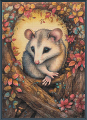 Stamped cross stitch of an opossum in a tree surrounded by autumn leaves