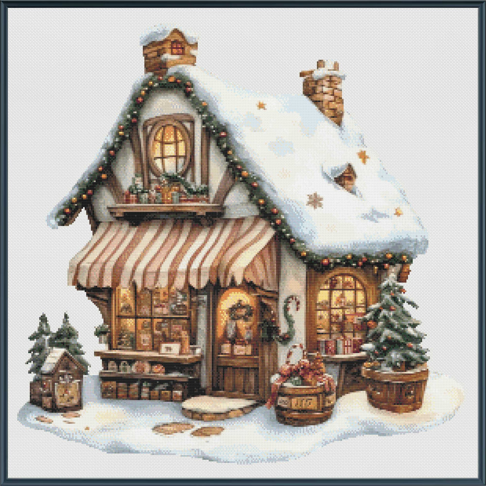 Decorative cross-stitch pattern of a snowy cabin with Christmas decorations.
