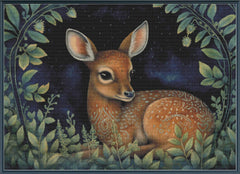 Stamped cross stitch of a Fawn surrounded by foliage and leaves against a dark background