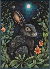 Stamped cross stitch of a rabbit with intricate patterns in a night-time forest setting.