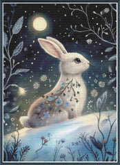 Stamped cross stitch mockup showing a licensed images of a White rabbit under a moonlit sky with flowers and leaves.