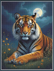Mockup of a stamped cross stitch showing a Tiger lying in grass with a full moon in the background