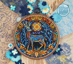 Stamped cross stitch design of a modern art blue deer