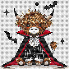 Stamped cross stitch design of a highland cow in a vampire costume with a red cape and black shoes on a white background.