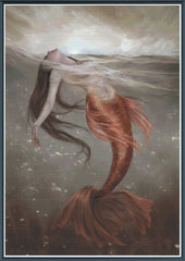 Stamped cross stitch mockup showing a licensed images of a Mermaid with a red tail floating underwater against a cloudy sky.