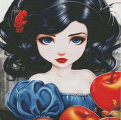 A cross-stitch depiction of a stylized bunny character with black hair, blue dress, and red apple accessories.