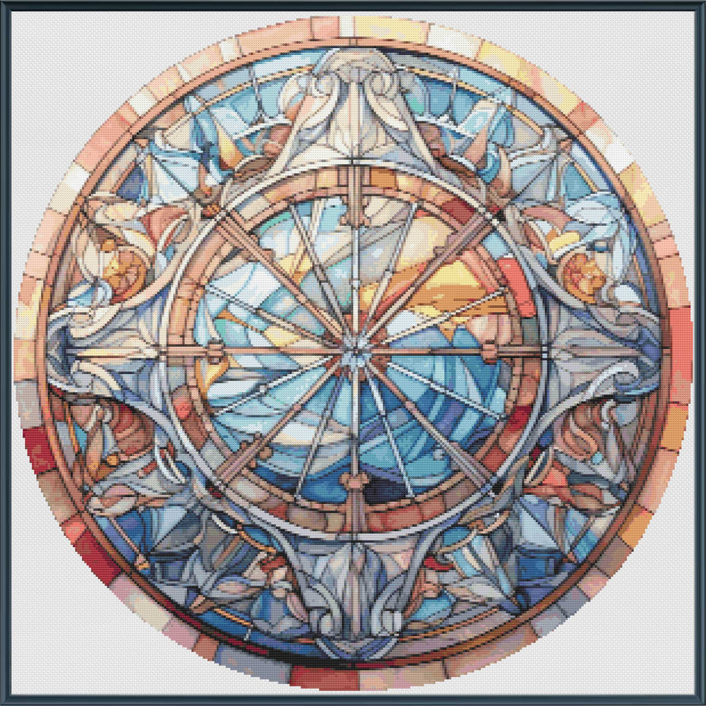 Decorative compass design with stained glass-like colors on a white background