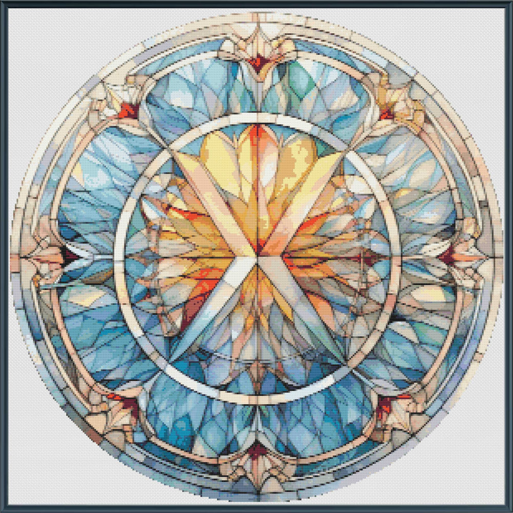 Stained glass design with a circular pattern featuring blue, yellow, and red colors.