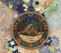 Stamped cross stitch design of a cabin in a forest, surrounded by flowers
