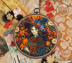 Stamped cross stitch design of a colorful floral design on a textured background with flowers and lace.