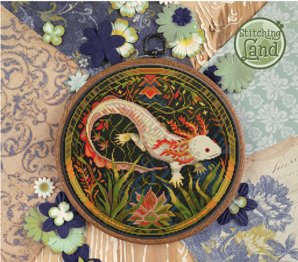 Stamped cross stitch design of a axolotl design on a textured fabric background