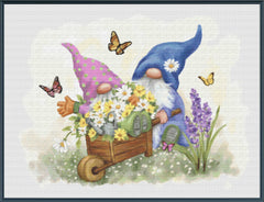 Two gnomes with a cart full of flowers and butterflies on a light background