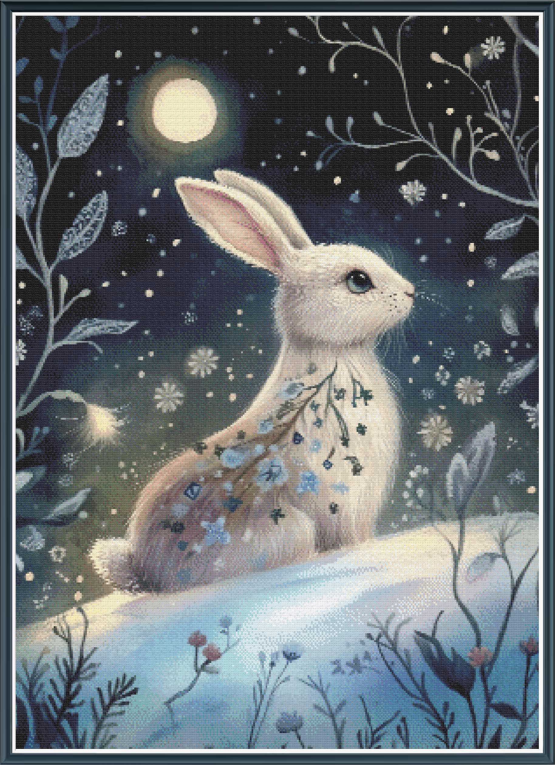 Stamped cross stitch mockup showing a licensed images of a White rabbit  under a moonlit sky with flowers and leaves.