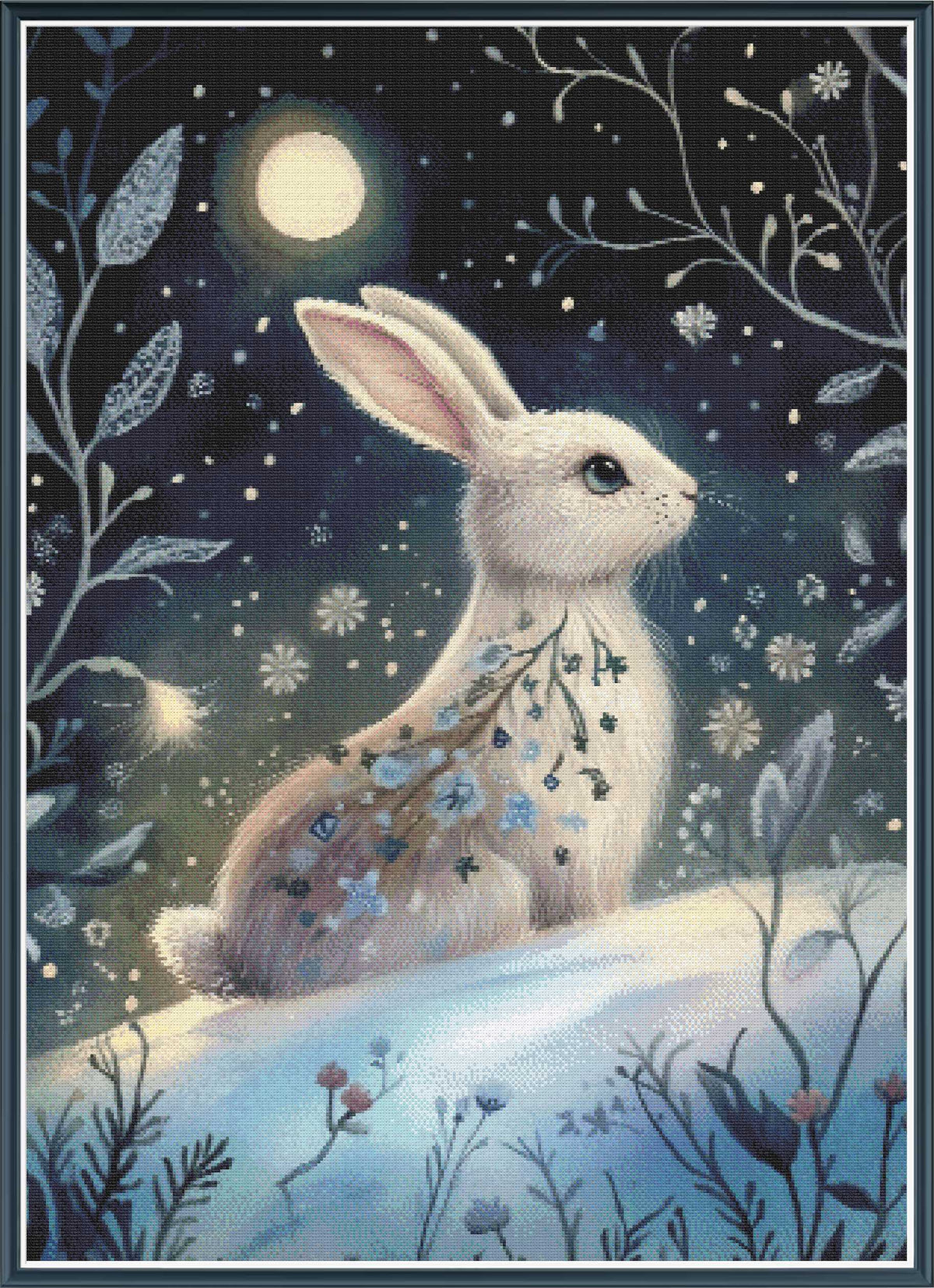 Stamped cross stitch mockup showing a licensed images of a White rabbit  under a moonlit sky with flowers and leaves.