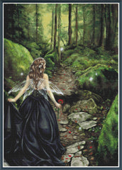 Stamped cross stitch mockup showing a licensed images of a  fairy in a dark blue gown holding a red flower in a forest setting