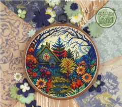 Stamped cross stitch design of  a colorful floral and nature design, surrounded by decorative flowers and patterns.